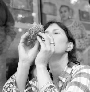 Nikki teaching us how to make fire with a bow drill. 